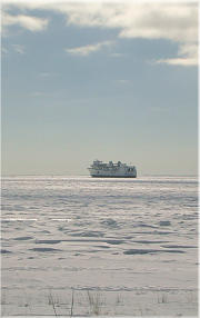 The cutter Acacia at work clearing ice from the channel 